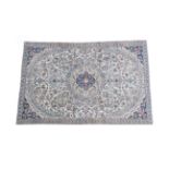 Nain Carpet Central Iran, circa 1970 The field of floral vines around a cusped medallion framed by
