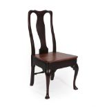 A Late 17th Century Walnut Dining Chair, the solid splat above a boarded seat and plain seat rail,