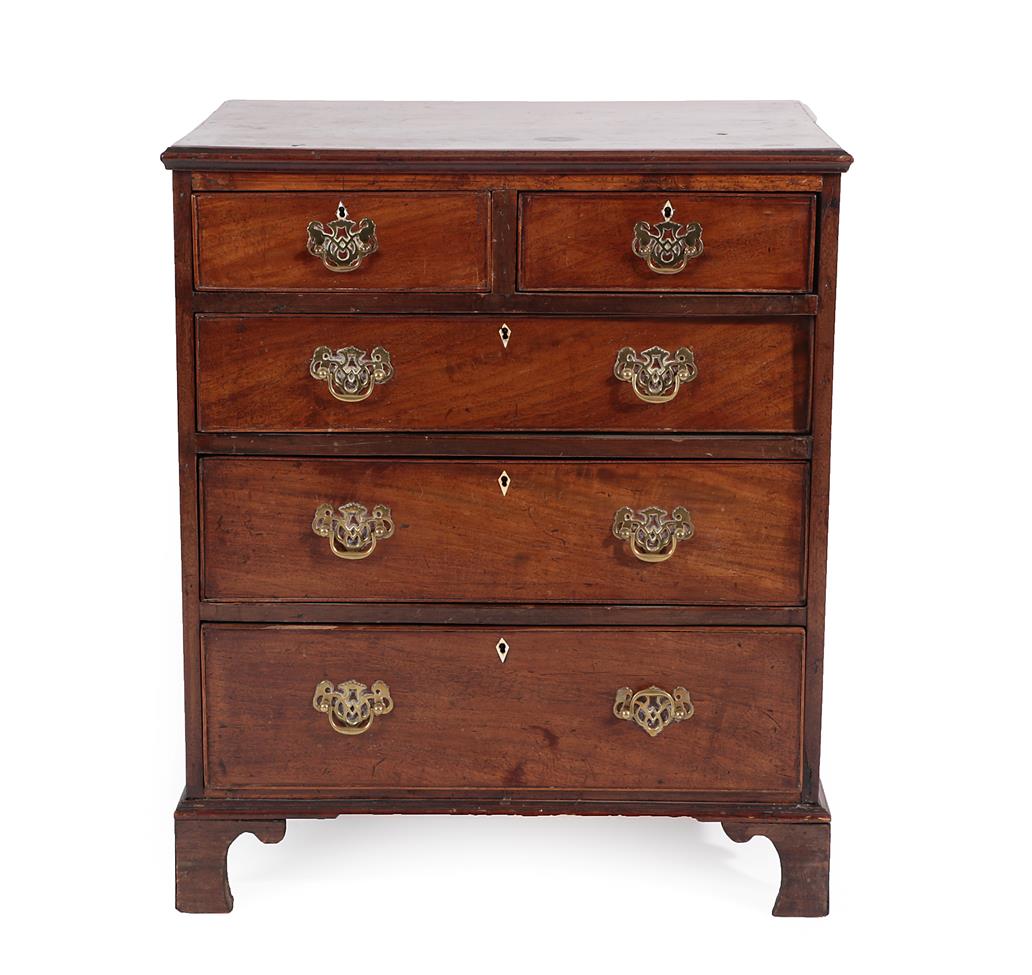 A George III Style Mahogany Straight Front Bachelor's Chest, the moulded top above two short and