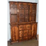 A Georgian style mahogany breakfront secretaire bookcase, moulded cornice above astragal