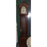 A reproduction Westminster chiming longcase clock, with three brass weights