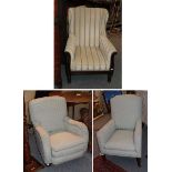A William IV mahogany framed wingback arm chair, carved acanthus scroll arms, striped upholstery;