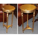 A pair of modern gilt jardiniere stands