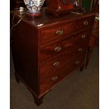 A George III mahogany chest of drawers, two short over three long graduated drawers, oval brass