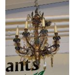 A 20th century gilt metal chandelier One or two lustre drops lacking otherwise appears OK. Drop is