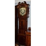 A mahogany oval white dial eight day longcase clock, signed J Stonehouse, Leeds, circa 1800, swan