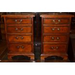 A pair of modern mahogany pedestal cabinets of four graduated drawers, 72cm high