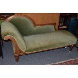 A Victorian mahogany chaise lounge