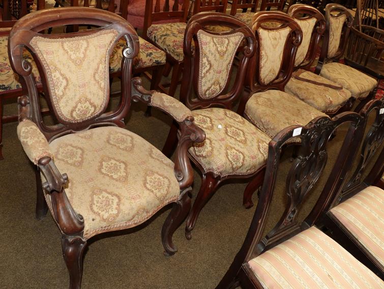 A set of five Victorian carved mahogany dining chairs, including one carver (5)