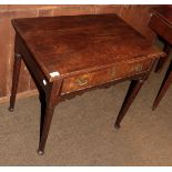 An 18th century and later oak side table, single drawer with tapered legs and pad feet, 75cm wide