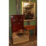 A modern Wellington style display cabinet, the glazed upper section over six drawers, plinth base,