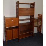 Teak Staples Ladderax sectional modular adjustable shelving units, consisting of shelves and