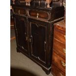 An oak fitted linen cupboard with tray, two drawers over two cupboard doors, 120cm high by 104cm