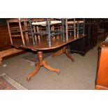 A 19th century mahogany D-end dining table, with a single leaf raised on twin tripod bases, 185cm