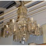 A glass lustre drop chandelier