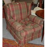 A tartan upholstered armchair