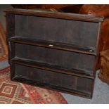 An 18th century oak hanging wall shelf