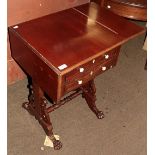A Victorian mahogany work table, twin drop flaps, two frieze drawers, trestle support with stretcher