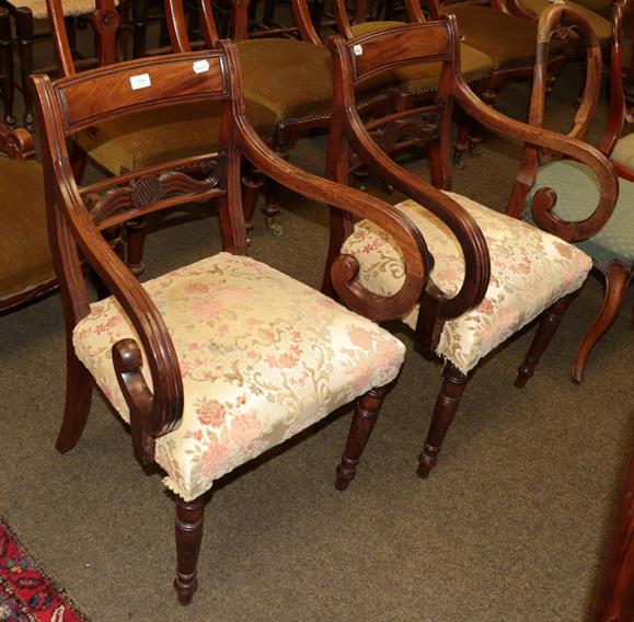 A pair of early 19th century mahogany open armchairs (2)