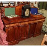 Victorian mahogany sideboard, galleried serpentine back, three cushion drawers above four cupboard