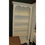 A white painted five-tier open bookcase, 188cm high by 89cm wide