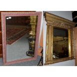 A gilt wall mirror of architectural form with another mirror (2)