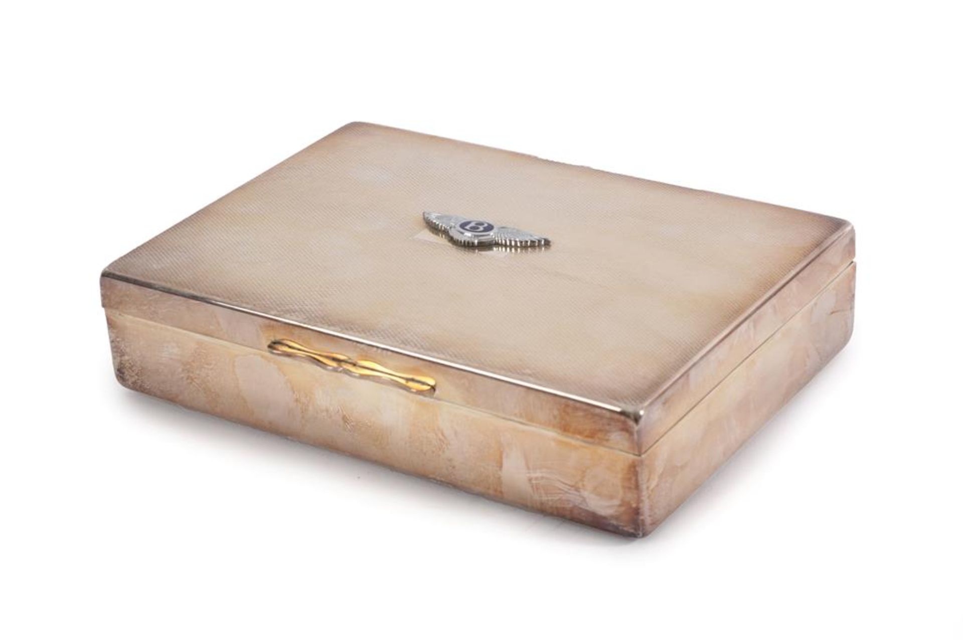 Bentley Interest: A Silver Plated Showroom or Desktop Cigar Case, with engine turned cover and