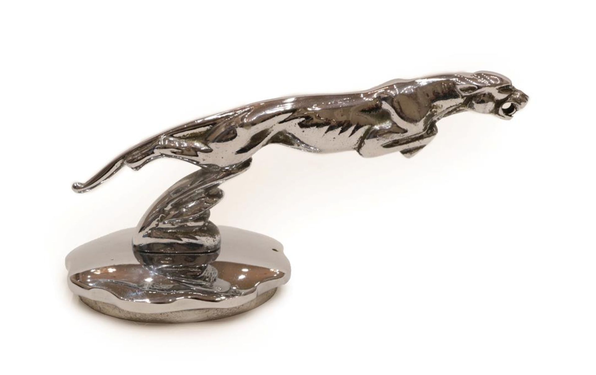 Jaguar: A 1930's Chrome Car Mascot, the leaping cat mounted on a threaded radiator cap, 19cm