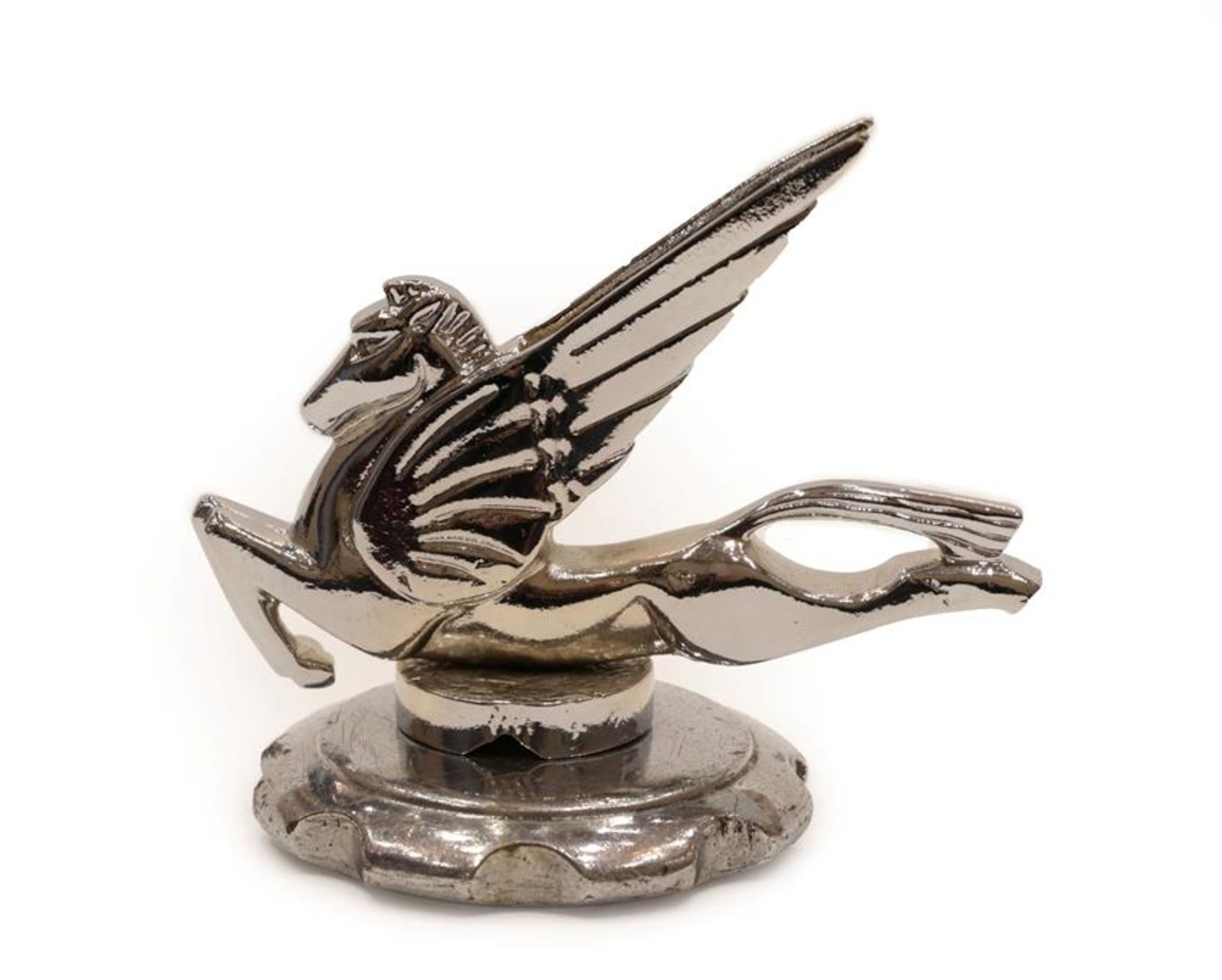 A 1930's Chromed Car Mascot as Pegasus, the winged horse on a circular base and screw-thread