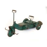A 1920/30 Child's Green Painted and Metal-Bodied Three-Wheel Pedal Car, of stylised form, with