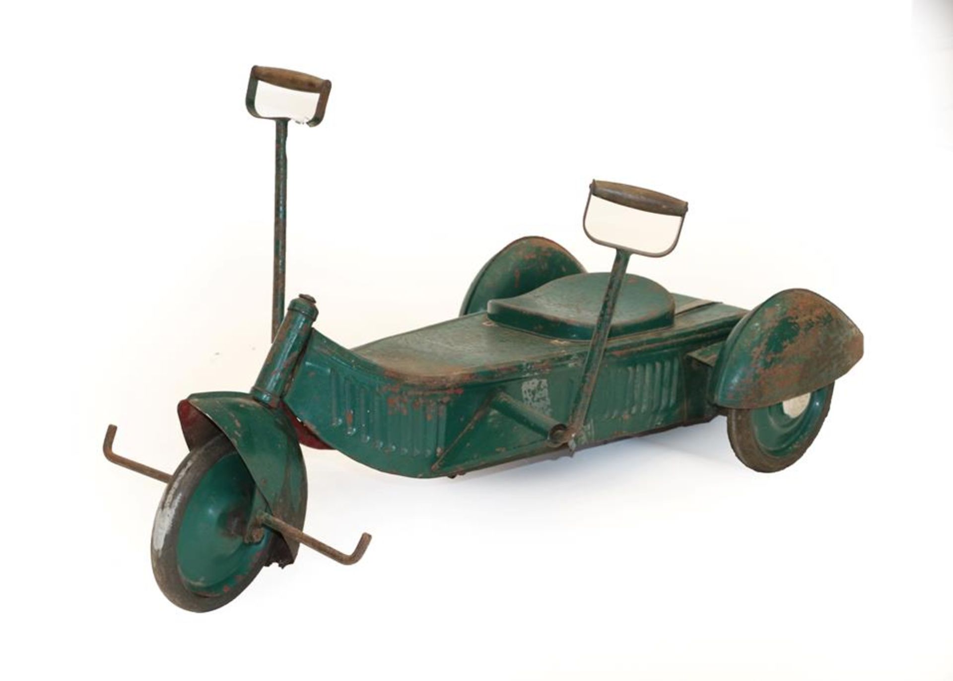 A 1920/30 Child's Green Painted and Metal-Bodied Three-Wheel Pedal Car, of stylised form, with