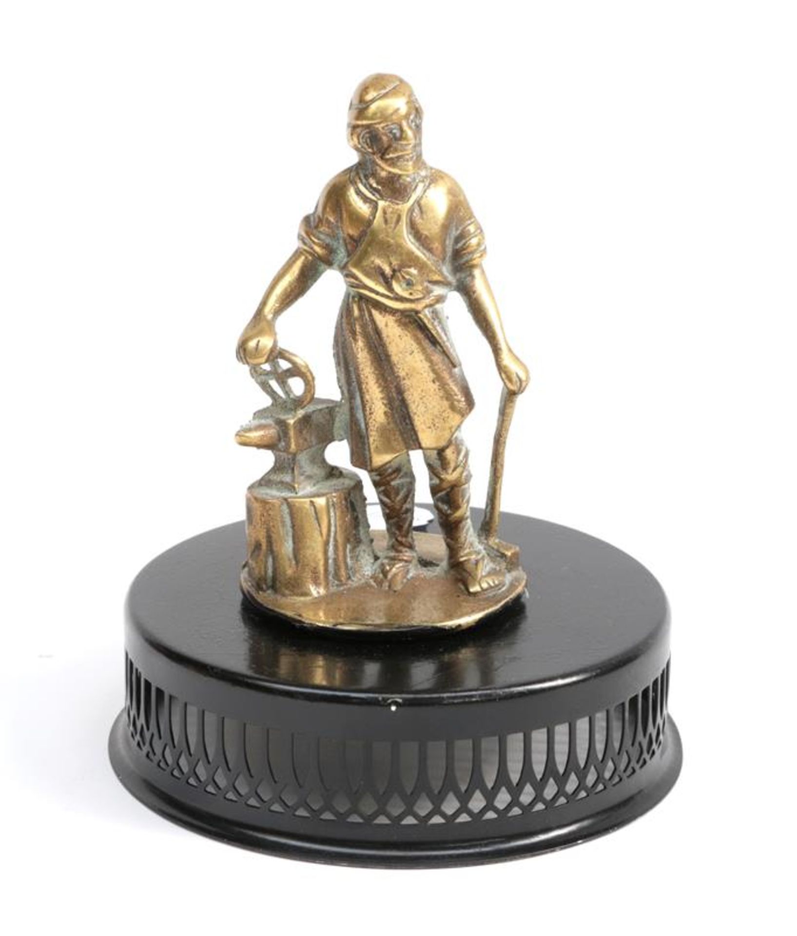 Vulcan: An Early 20th Century Brass Blacksmith Radiator Car Mascot, mounted on a circular metal