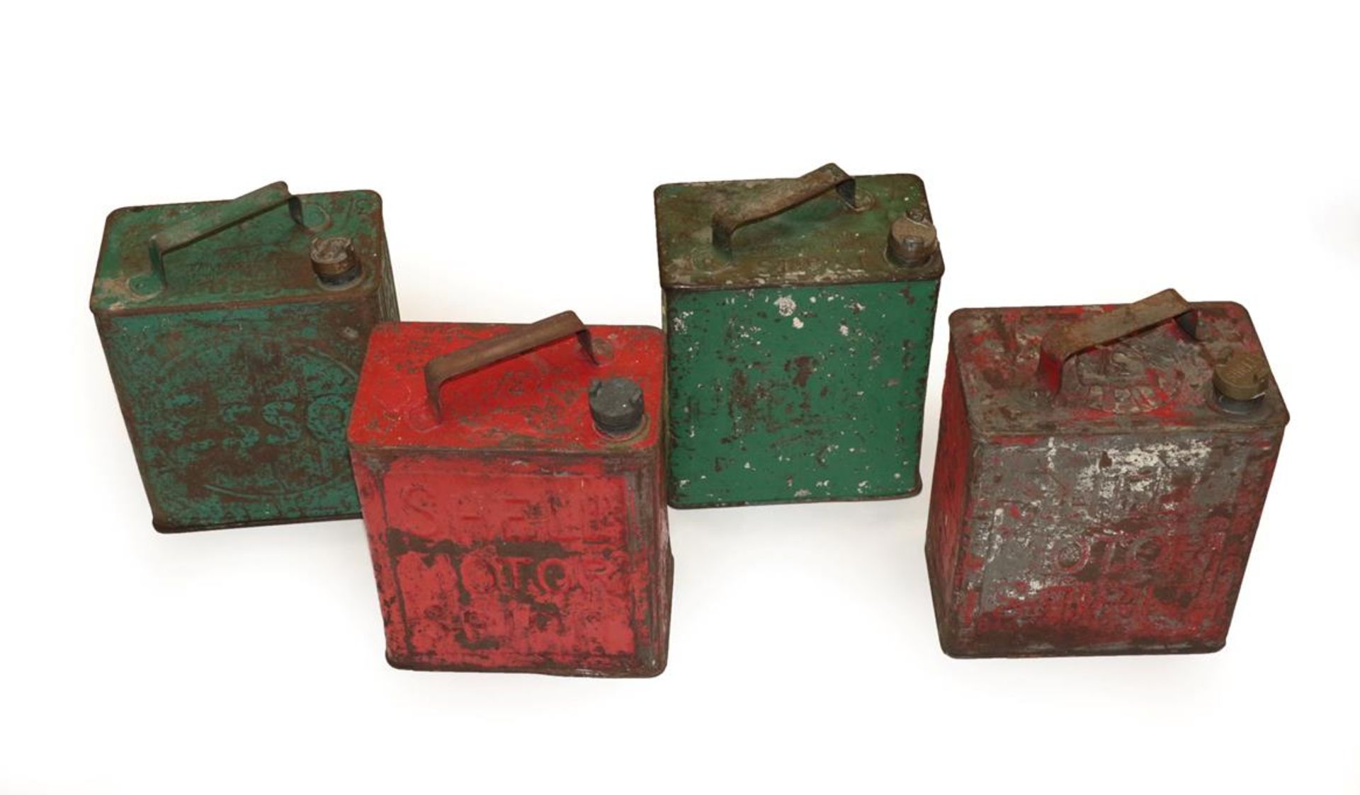 Four Vintage Metal Fuel Cans, comprising two red Shell Motor Spirit, a green Pratts, and a green