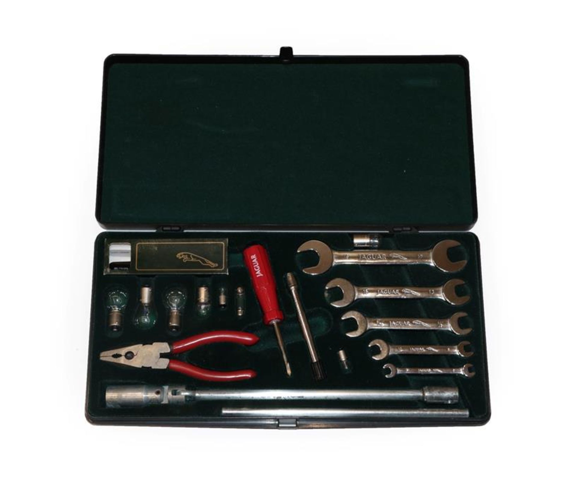 An Original Jaguar XJ Service Kit, contained within a black plastic case, containing five chromed