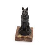 A 1920's Bronze Cast Dog Mascot, signed Ruffony, modelled as a seated Alsatian, on a circular
