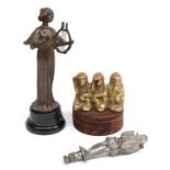 An Early 20th Century Brass Accessory Car Mascot as The Three Wise Monkeys, See No Evil, Speak No