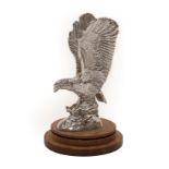 Alvis: A 1930's Chrome Plated Car Mascot as an Eagle, mounted on a circular wooden base, 15cm high