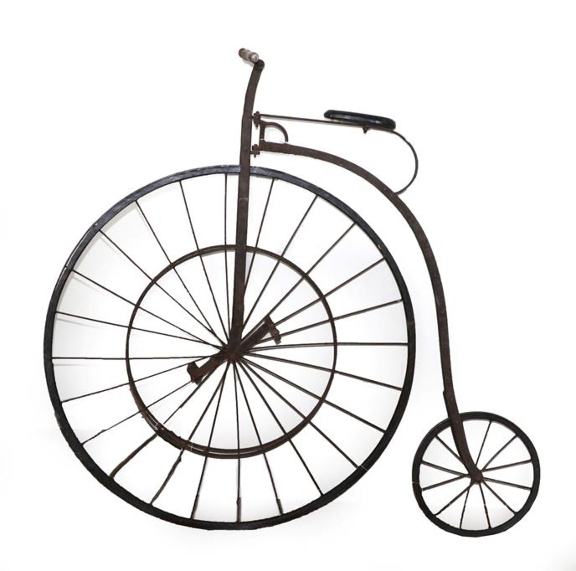 A Penny Farthing or Penny Ordinary Bicycle, with spoked and solid wheels, the shaped handle bars