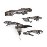 Four Vintage Jaguar Chrome Car Mascots, comprising a large example, 18cm wide (damaged), a pair of