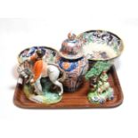 Two Staffordshire figures, two Ironstone bowls and an Imari vase and cover