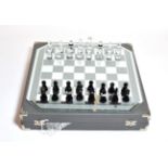 A silver crystal Swarovski chess set, boxed
