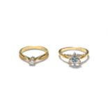 A 9 carat gold diamond solitaire ring, finger size N; and a 9 carat gold diamond and blue zircon