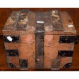 A 19th century iron bound oak cash box with wax seal remnants and bearing label for London