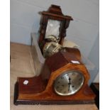 A selection of clocks including a Vienna type wall clock, two mantel clocks, Comitts of London