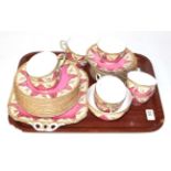 A Royal Worcester pink and gilt part tea service