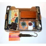 A mahogany cased miniature travel chess set, bone pieces; with miscellaneous games tools,