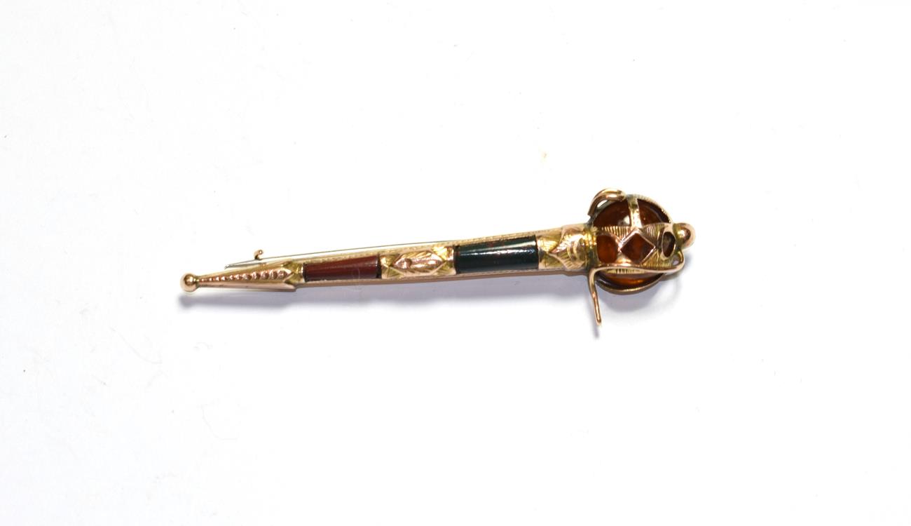 A Scottish hardstone brooch, stamped '9CT', length 6.6cm . Gross weight 5.0 grams.