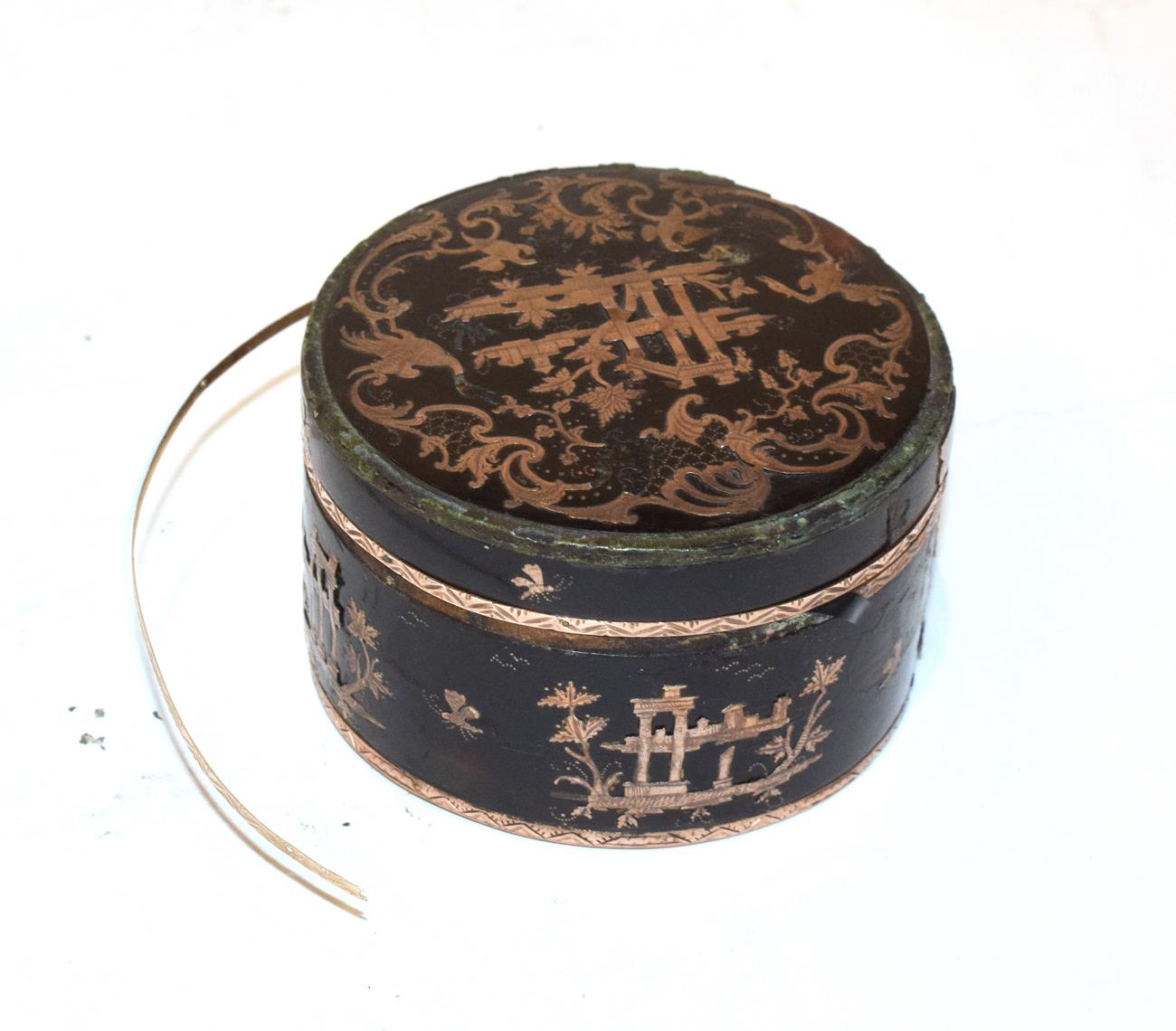 A 19th century yellow metal mounted tortoiseshell box and cover, with chinoiserie decoration (a.f.),