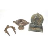An Indian brass shrine, a cast metal pedestal bowl and a brass shrine (3)