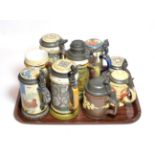 Mettlach steins with various painted scenes including Villeroy & Boch examples and 'The Red